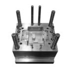 Metal injection mold with multiple guide pins and a rectangular cavity for forming a plastic